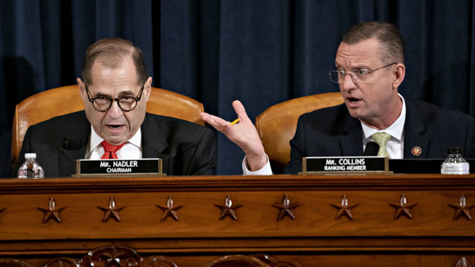 House Judiciary Committee Chairman Rep. Jerrold Nadler, D-N.Y., left, and ranking member Rep. Doug Collins, R-Ga., right, both speaking during a House Judiciary Committee markup of the articles of impeachment against President Donald Trump, on Capitol Hill Thursday, Dec. 12, 2019, in Washington. (Andrew Harrer/Pool via AP)